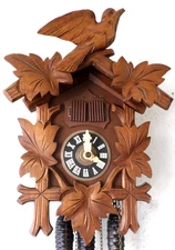 NICE WORKING ANTIQUE BLACK FOREST SWISS LADOR MUSICAL TRADITIONAL CUCKOO CLOCK!