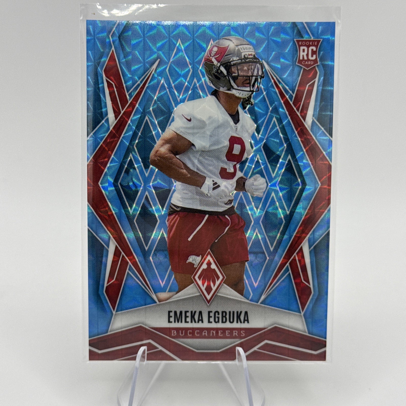 2025 Panini Phoenix - Rookies Emeka Egbuka #225 Light Blue Pyramids /385 (RC)