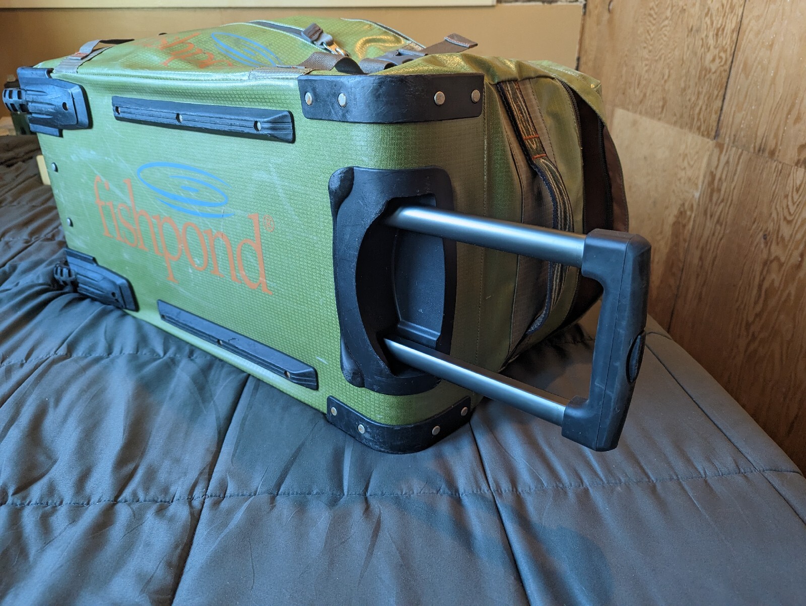 Fishpond Teton Rolling CarryOn Fishing Luggage Bag Green