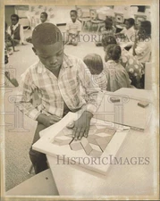 1970 Press Photo Boy working with puzzle at Lorah Park Elementary School, Miami