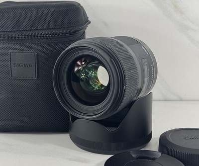 Sigma 35mm f/1.4 DG ART Lens for Canon EF Mount - With Caps, Hood, And Bag