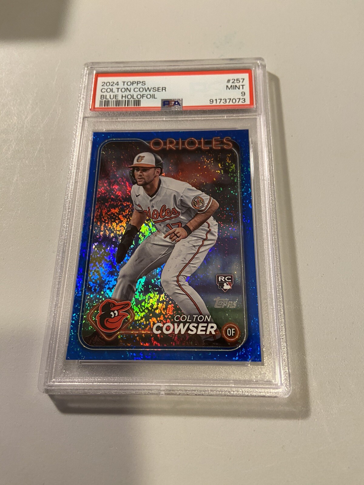 2024 Topps #257 Colton Cowser Blue Holofoil #/999 Orioles Rookie RC PSA 9