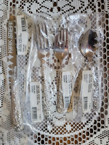 Repousse by Kirk Stieff   4-Pc. Place Set.,  Factory New,   Sterling