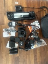 Exceptional Condition Canon EOS Black 2000D with All Lenses  Accessories Mint
