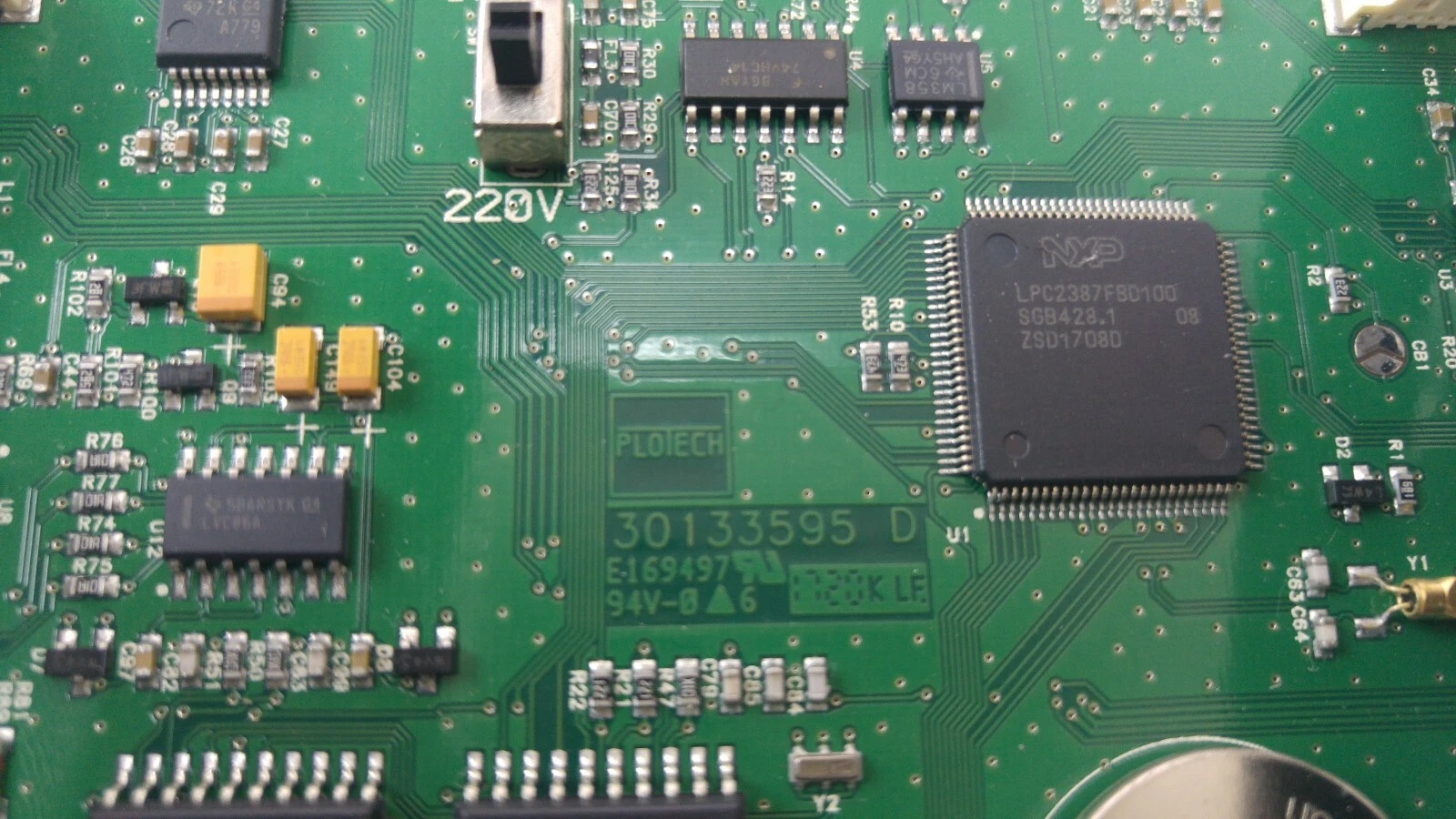 Board close-up: NXP LPC2387FBD100 chip, PLOTECH 30133595 D marking, 220V switch