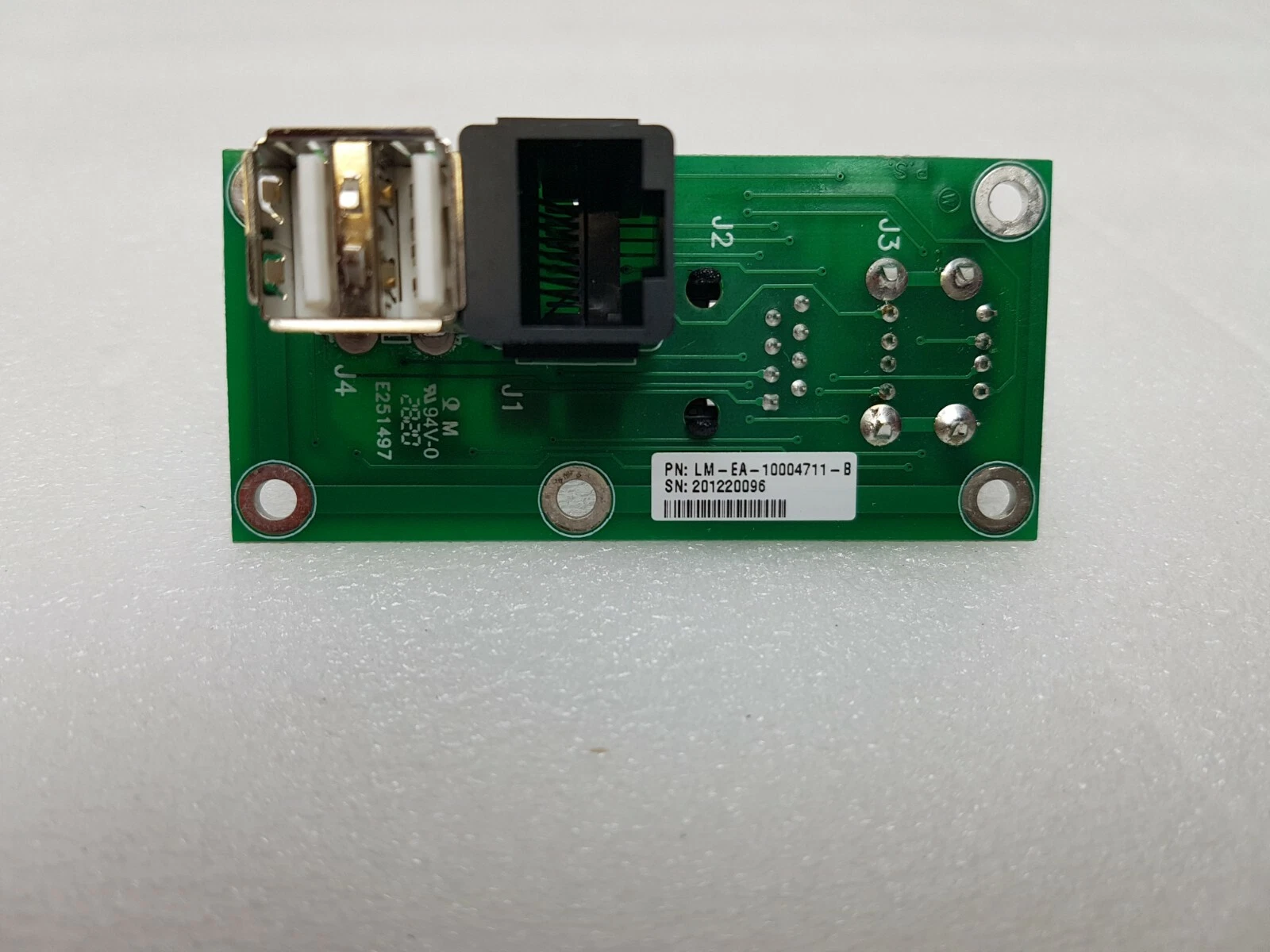 Back of the Lumenis board with label PN LM-EA-10004711-B, SN 201220096