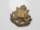 WW1 East Surrey Regiment Economy Cap Badge