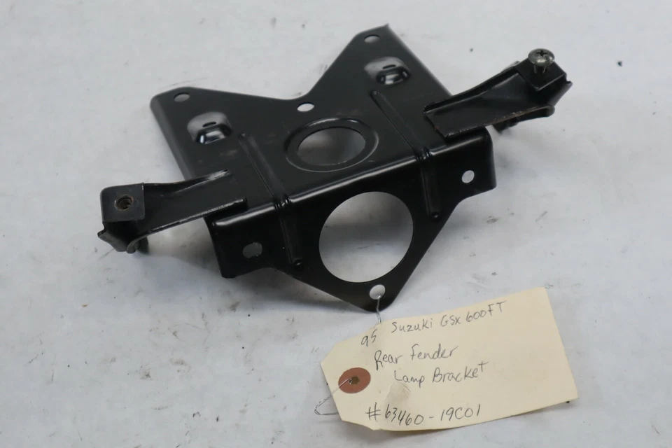 Soporte de lámpara de guardabarros trasero para motocicleta Suzuki 1995 Katana GSX600 63460-19C01 FABRICANTE DE EQUIPOS ORIGINALES Foto 2 de 3