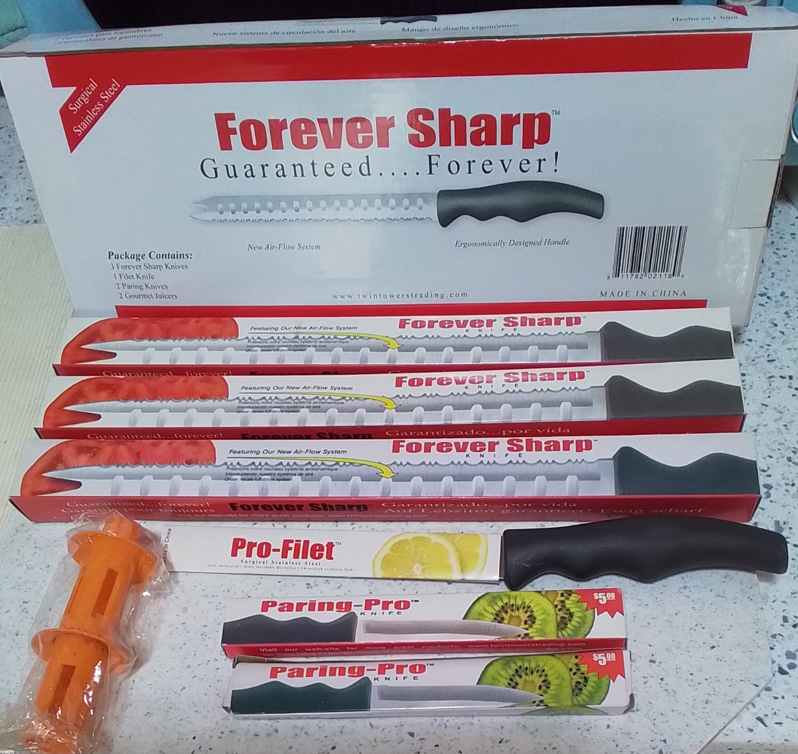 Forever Sharp Knife Set 8pc carving , bread, paring, filet, and 2 juicers. New