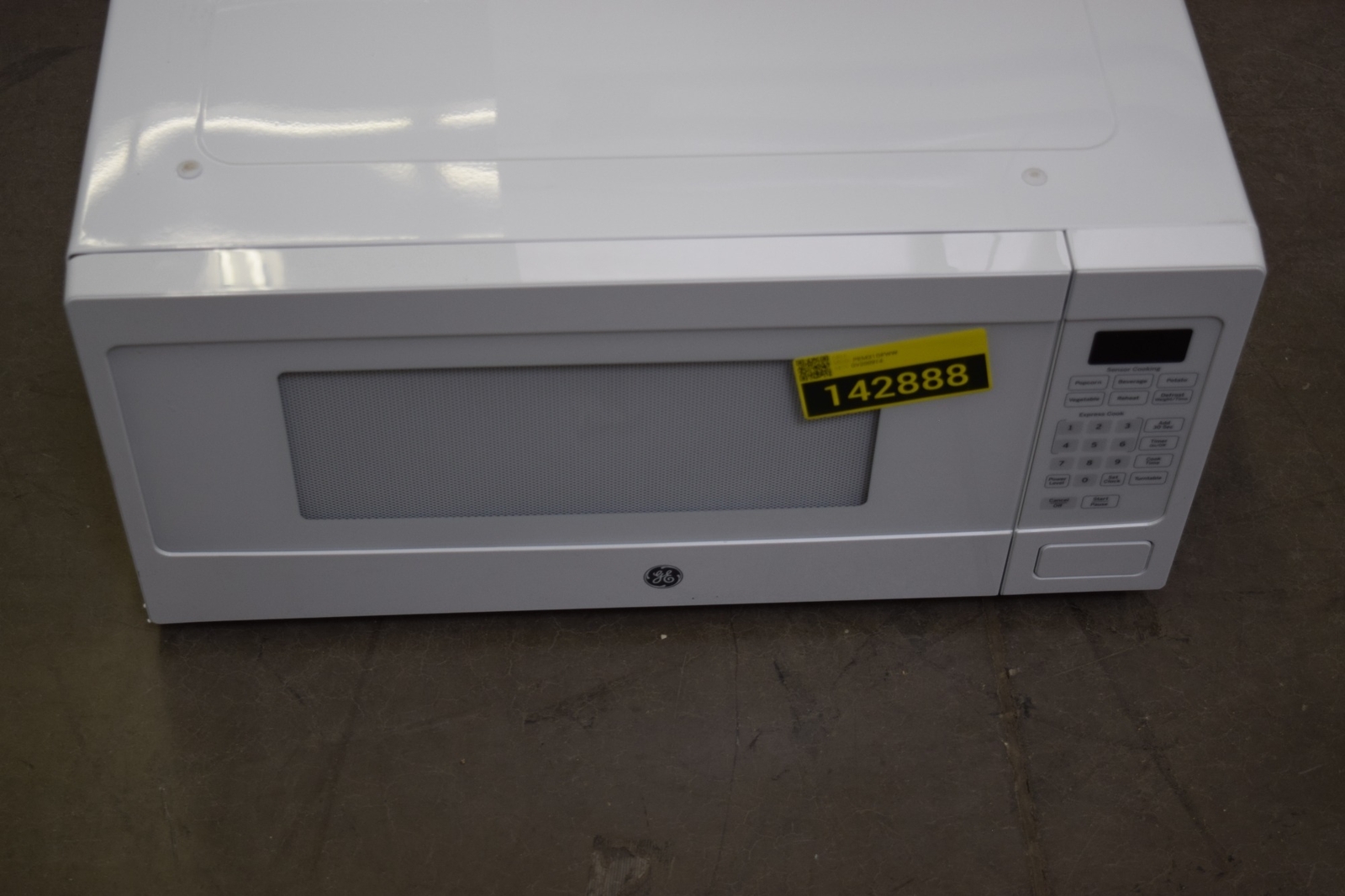 GE Profile PEM31DFWW 24" White 1.1 Cu. Ft. Countertop Microwave NOB