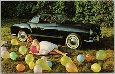 Vintage 1960s Volkswagen KARMANN GHIA Advertising Postcard Black Car / Balloons