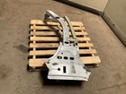 Silver 13-18 RAM 1500 front left driver frame apron radiator support with jagged edges on concrete pallet.