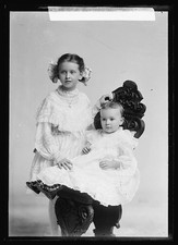 Photo:Burnadette Hacker Portrait Two Children in White Dresses