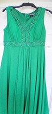 This green with beaded trip top, elegant dress has never been worn.