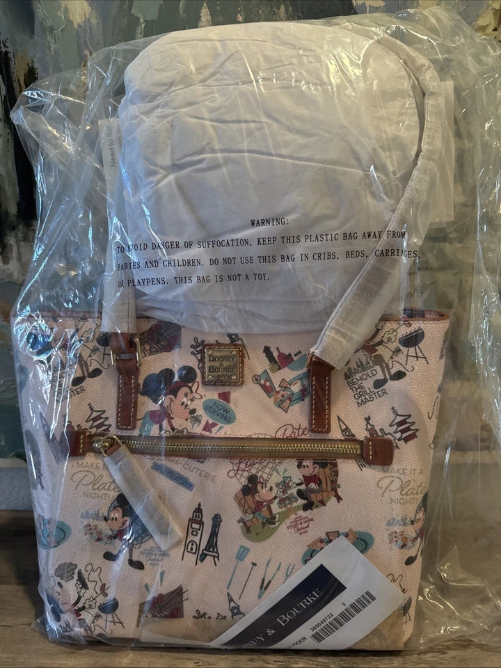 NUEVO Bolso de Mano Mickey And Minnie Mouse Dooney And Bourke Epcot Food and Wine 2022  Foto 2 de 3