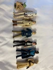 7 vintage kenner star wars action figures (Han Solo (2), Lando, Yoda, and more)