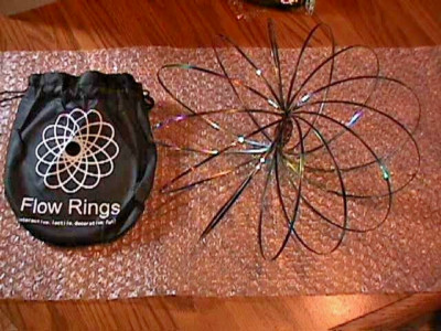 WHOLESALE 37 PC RAINBOW COLOR FLOW RINGS IN BAGS STRESS RELIEF JUST FUN FUN!!