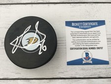 Brandon Montour Signed Autographed Anaheim Ducks Hockey Puck Beckett BAS COA b