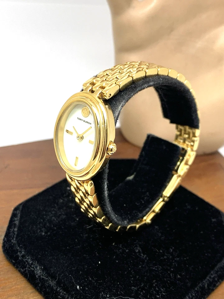 Reloj para mujer Tory Burch TBW6032 cuarzo ovalado esfera crema dorado acero inoxidable Foto 2 de 4