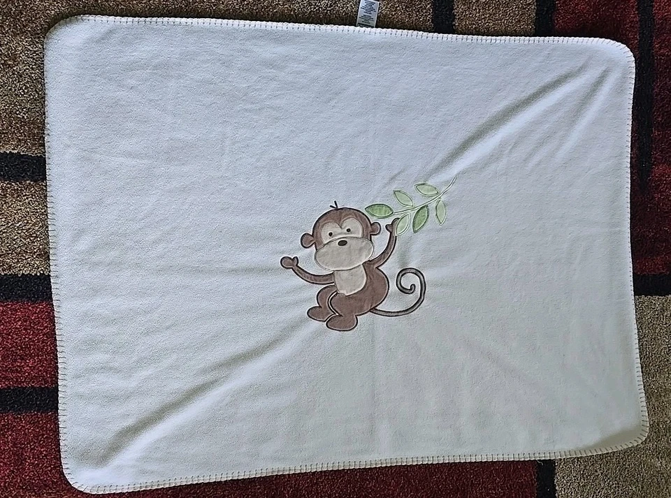 Manta polar para bebé Garanimals Cream Monkey Foto 3 de 4