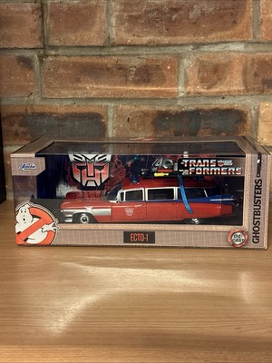 Jada 1:24 35466 Ghostbusters - Die Cast ECTO-1 / mash up Optimus Prime In Stk Now