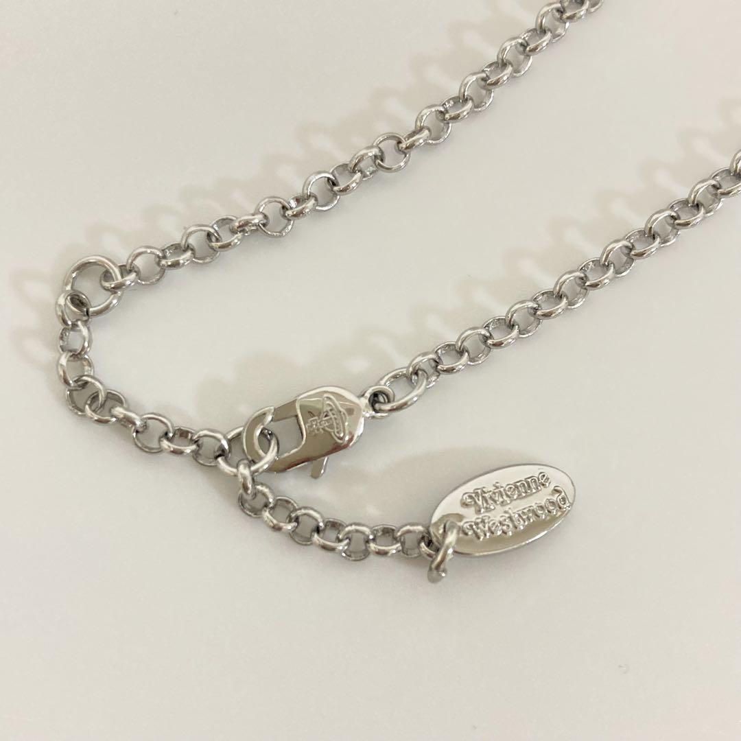 Vivienne Westwood Necklace Tiny Orb Red Silver w/drawstring Vivienne Westwood Necklace Tiny Orb Red Silver w/drawstring