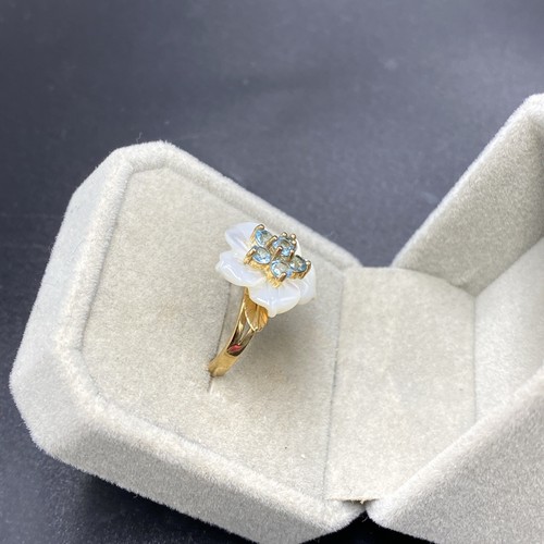 Anello in oro 9 kt con topazio blu e fiore di madreperla - QVC - Foto 5 di 8