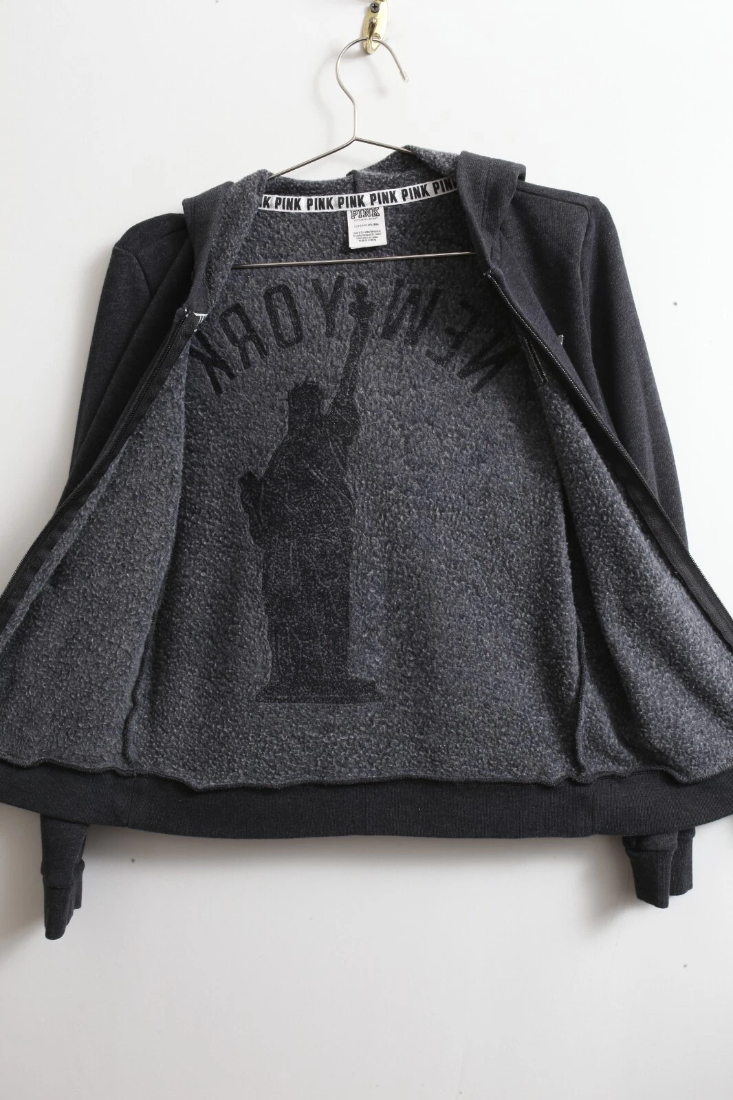 UNDERCOVER Giacca con cappuccio sequenza Statua della Libertà Victoria’s Secret NEW YORK ROSA USATA IN OTTIME CONDIZIONI