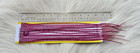 Whiting Saddle Hackle . Feather. Color; Grizzly/Dyed Pink.