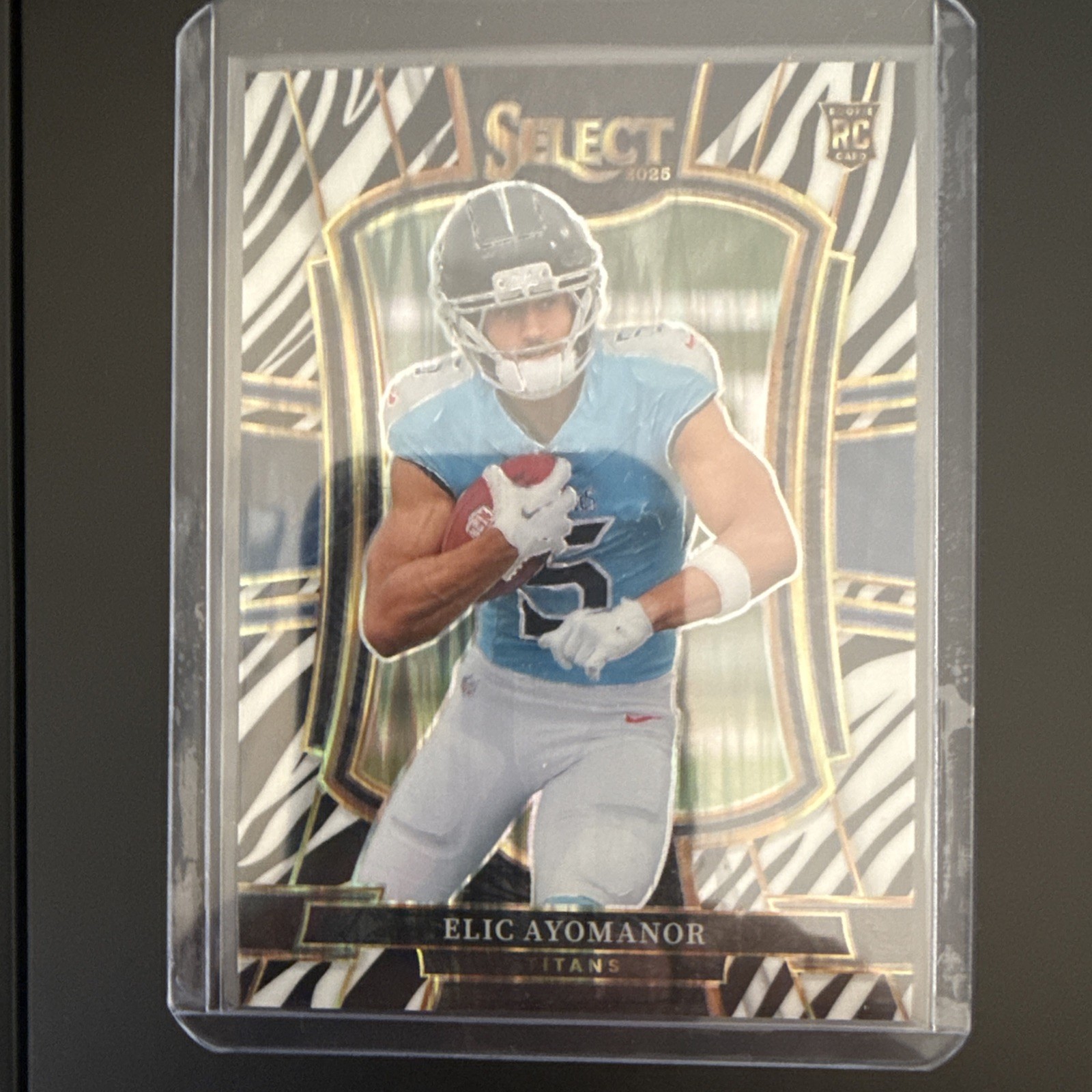 2025 Panini Select - Premier Level Elic Ayomanor #127 Zebra Shock Prizm (RC)