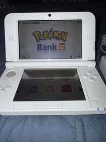 Nintendo 3DS XL Pink And White Handheld W/ Charger Pokemon Virtual Console Games
