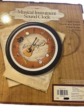 13.2 "Musical Instruement Sound Clock Brand new in original package from factory