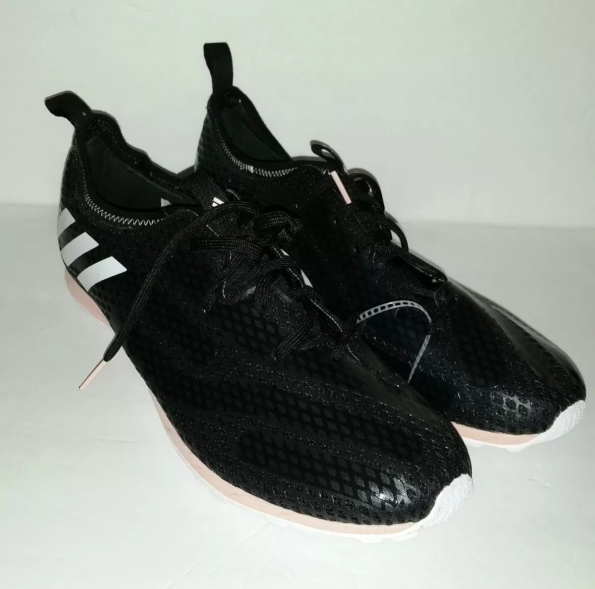 black adidas track spikes