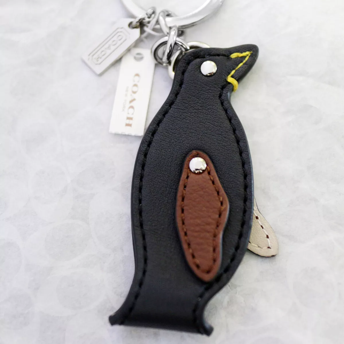 Coach penguin best sale keychain