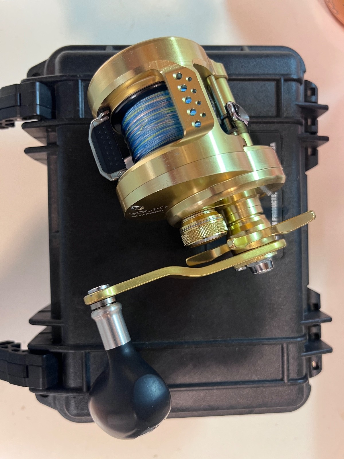 Shimano Ocea Calcutta Conquest 300PG Baitcasting Reel - Gold