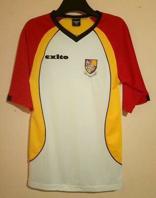 red and yellow football jersey