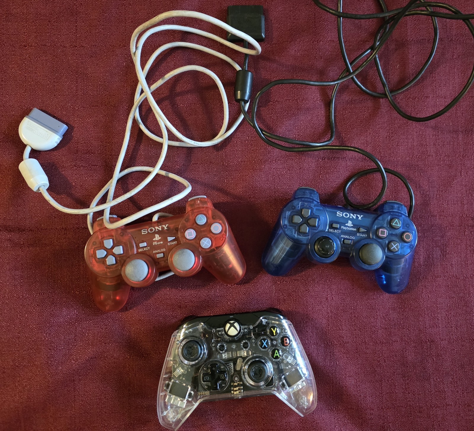 Lot of Two Playstation 2 Controllers and One Xbox Controller