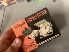 Swinglok Sophisticase by Volupte w/ original box