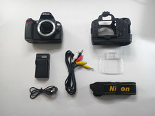 Nikon D40X 10.2MP Digital SLR Camera BODY (battery, charger, cables, skin)