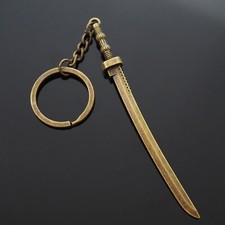 Llavero colgante largo de bronce samurai katana espada feudal guerrero de Japón