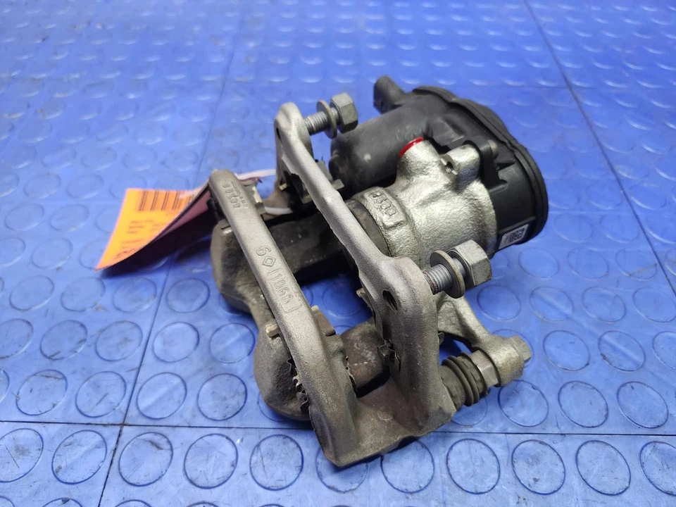 Conjunto de pinza de freno trasera izquierda lado del conductor OEM 68263130AA Jeep Renegade 15-23 Foto 2 de 4