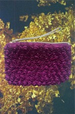 This vintage Neiman Marcus clutch wristlet evening bag is a stunning Burgundy