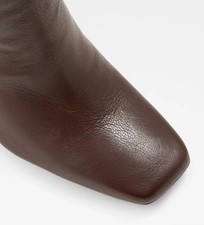 Brand new Aldo Brown heeled boots Real leather .