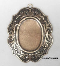 #4181 ANTIQUED GOLD 25x18 BORDERED PENDANT BEZEL W/TOP HANG RING - 1 Pc