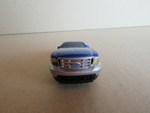 755J Maisto Hoodz 1999 Ford Super Duty Azul 1:64 - Imagen 6 de 7