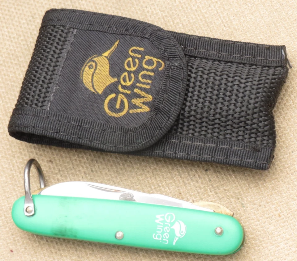 Cuchillo utilitario vintage CAMILLUS EE. UU. GREEN WING Scout - verde liso - grabado Foto 2 de 4