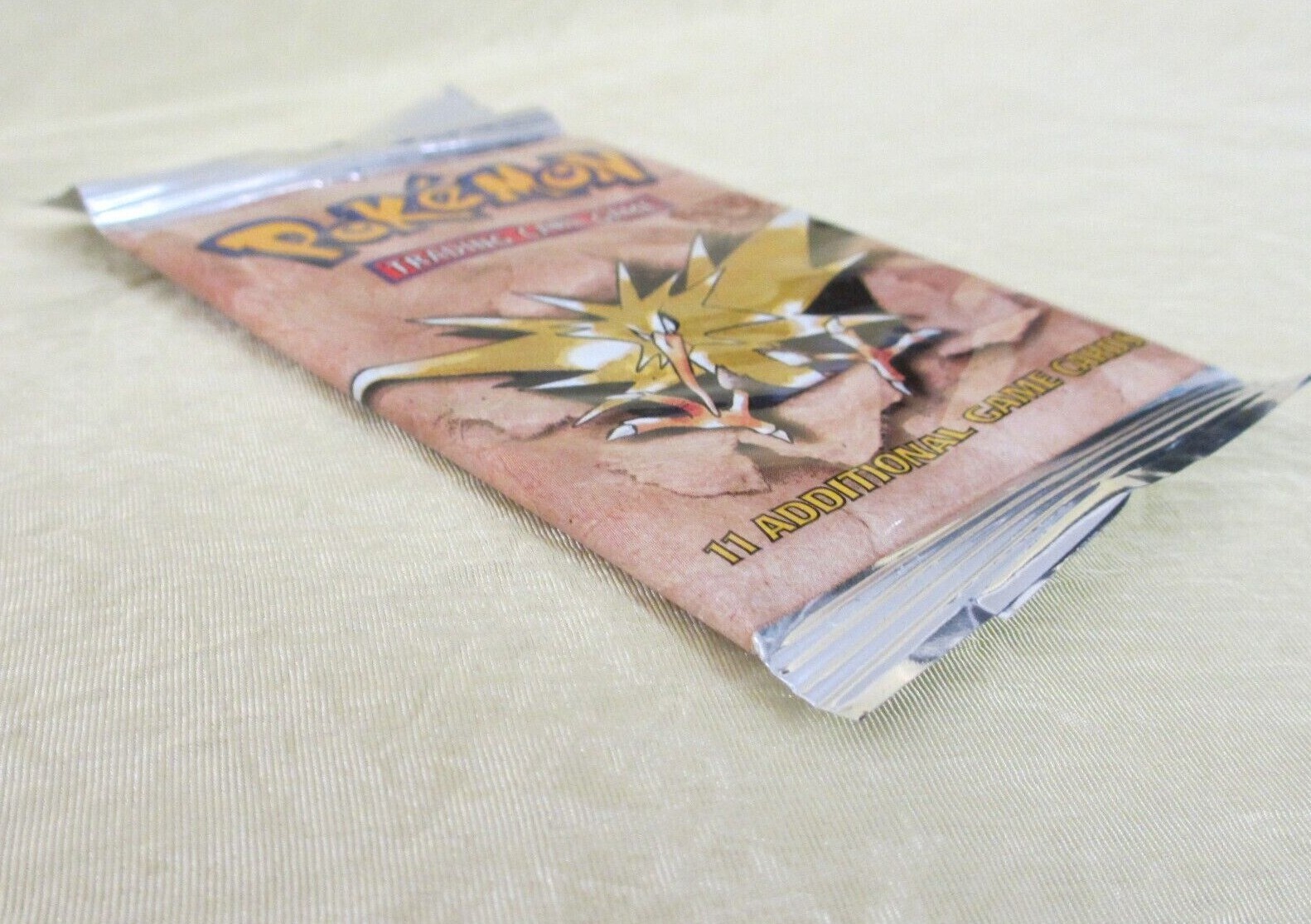 NEW sealed POKEMON 11+ card FOIL pack Fossil WOC06159 Zapdos isbn 1