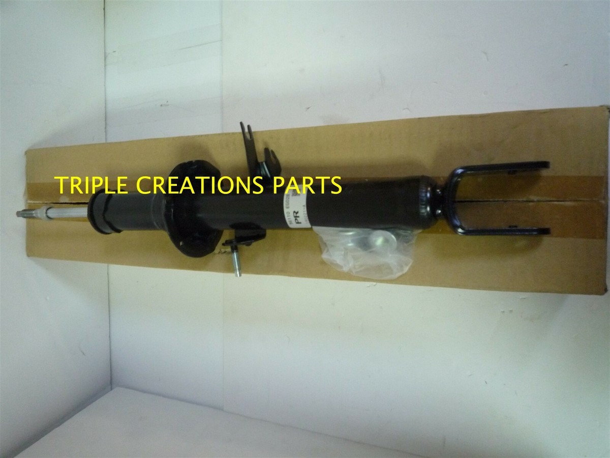 Genuine Nissan OEM E6110-EG02B SHOCK ABSORBER KIT-FRONT