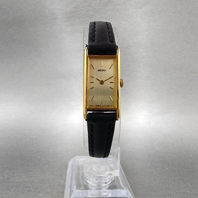 Seiko Tank Watch Women 13mm Gold Dial Gold Tone Rectangle 2e20