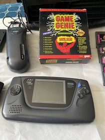 Sega Game Gear System- Console + 21 Games + Genie + Case and Accessories Works